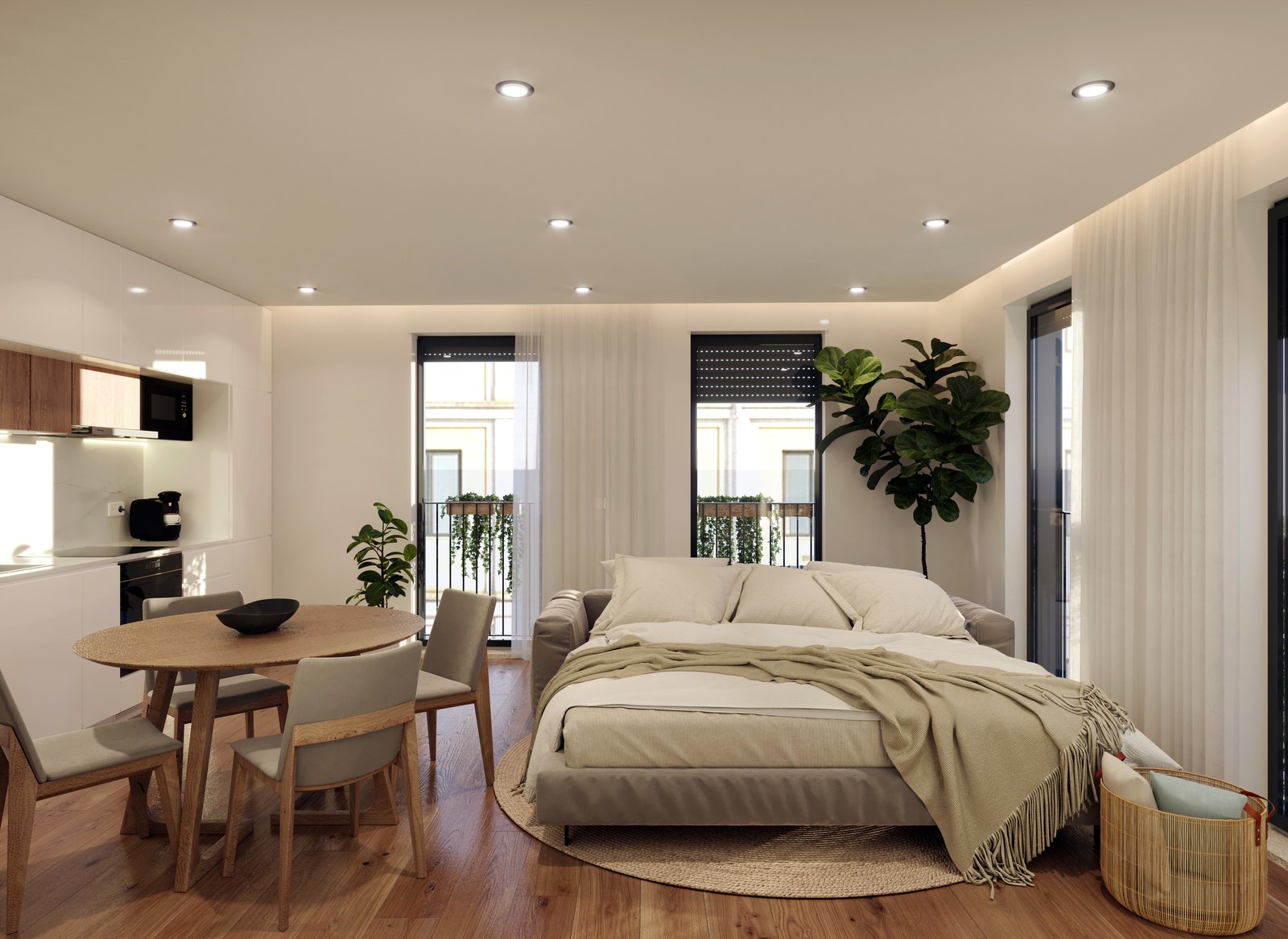 Studio apartment arranged with sleeping and dining areas